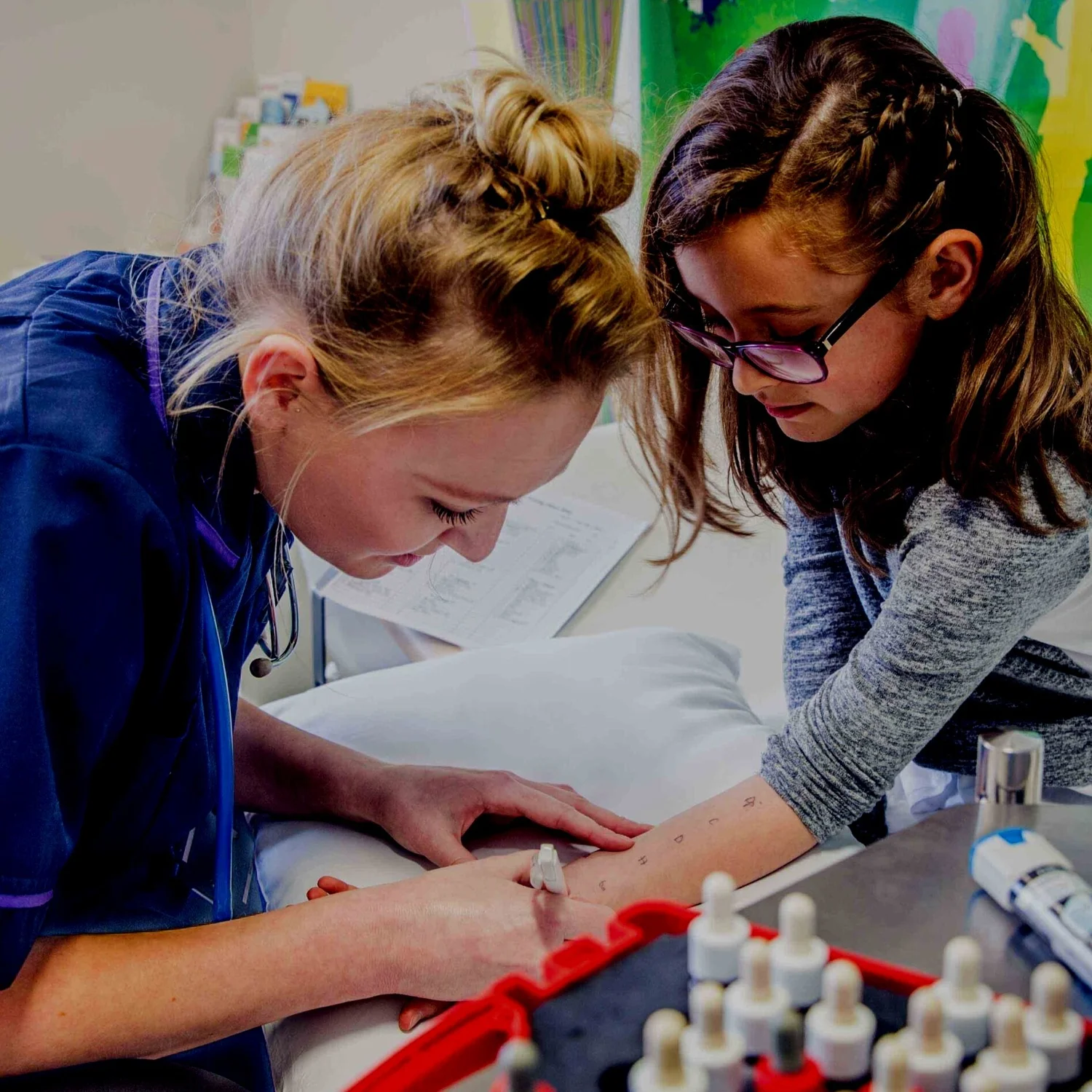 Consultant reviewing a treatment plan with a child